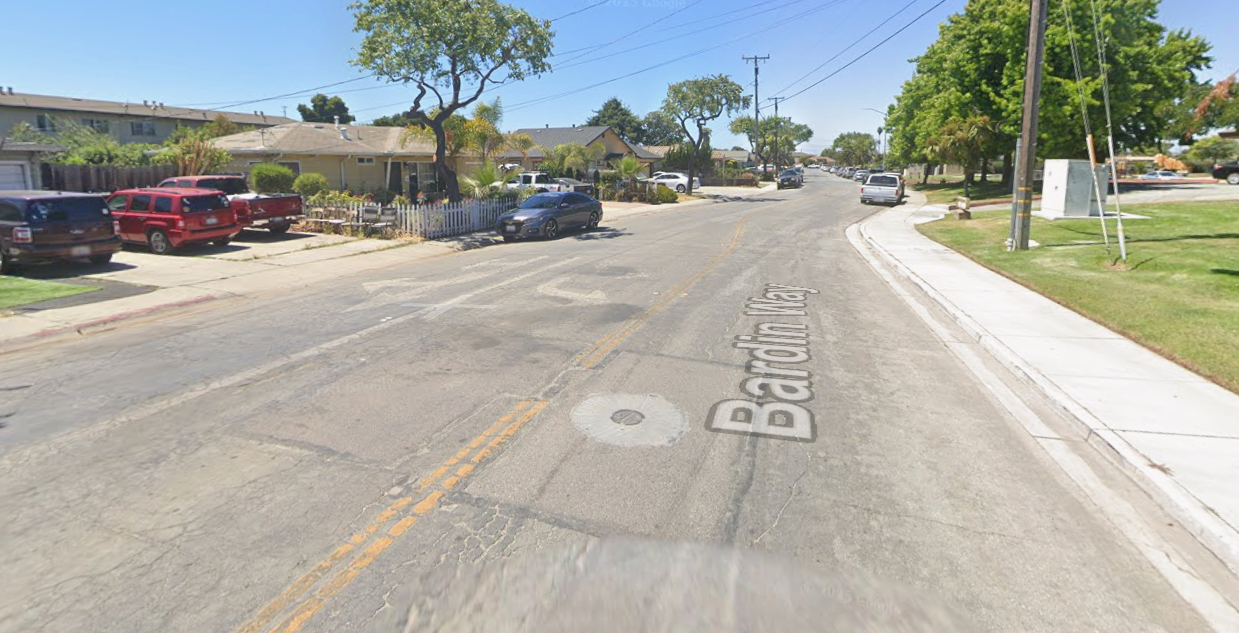 Photo of a road before it received pavement treatment and repairs.